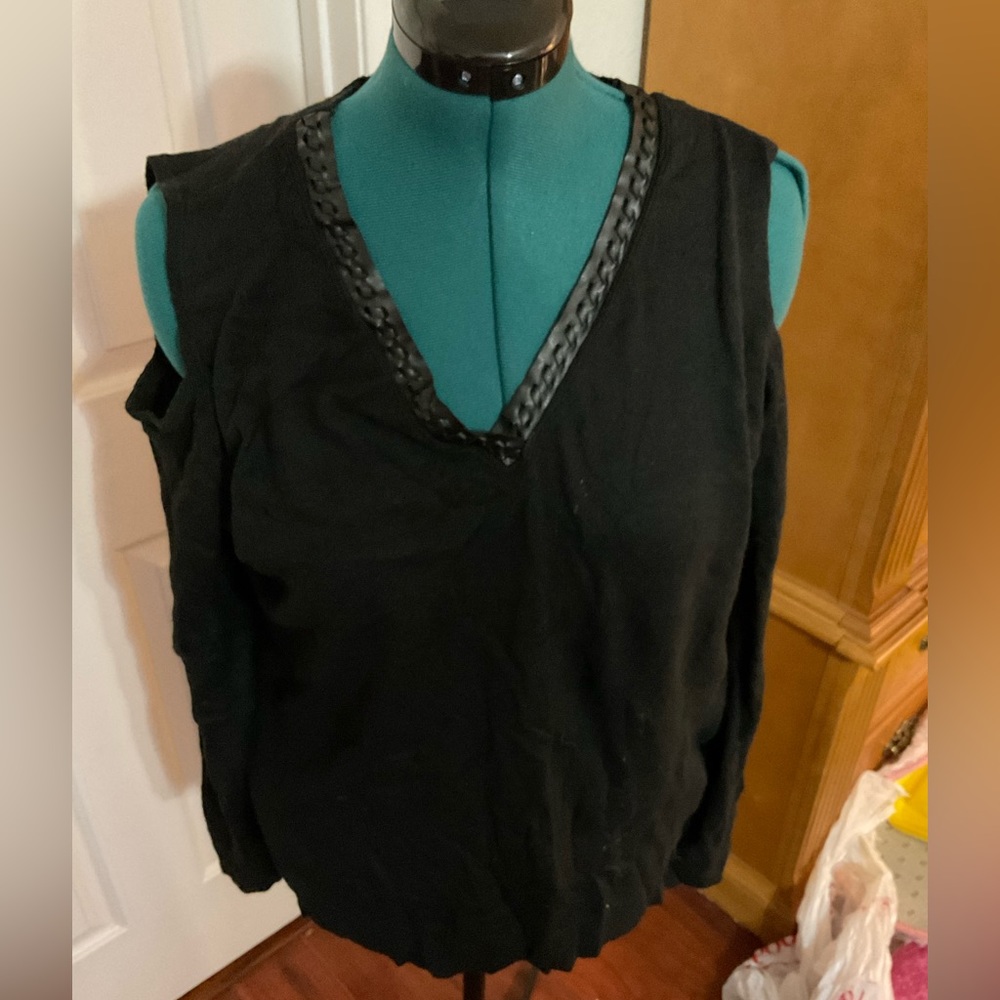 Black sweater with cold shoulders and leather v neck